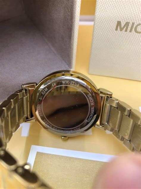 mk watch serial number verification